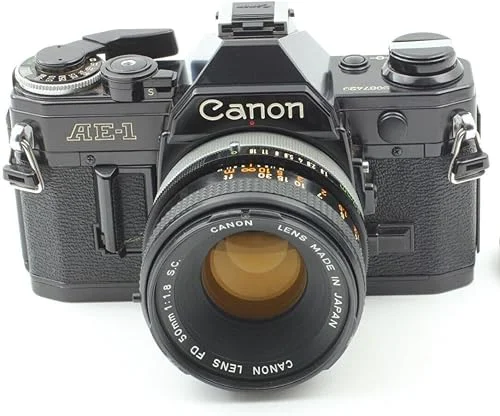 Canon AE-1 35mm SLR Film Manual Focus Camera (Black) with 50MM Canon FD Mount Lens. (Renewed)